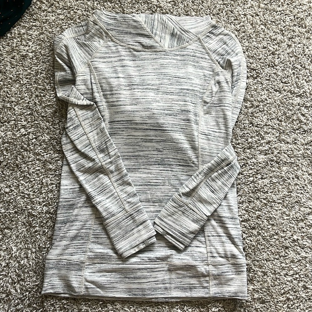 Lululemon Women’s running top with hood and zip pocket